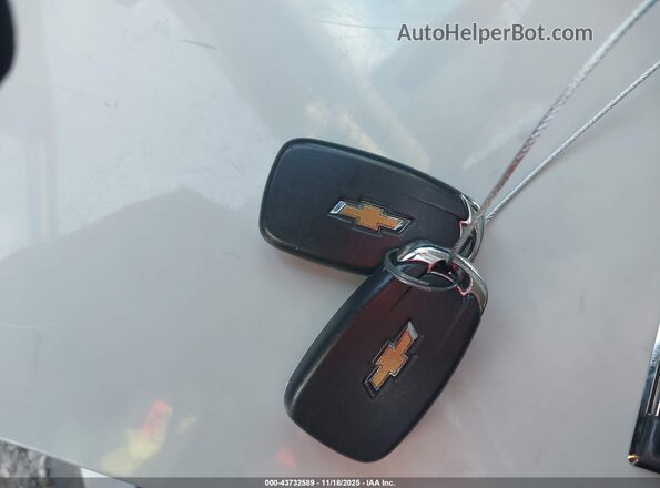 KL77LHE24RC040489 2024 CHEVROLET TRAX Белый Вид панели приборов