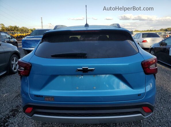 KL77LHEP4SC129450 2025 CHEVROLET TRAX Синий Вид сзади