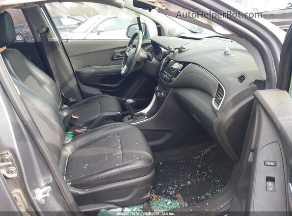 KL7CJPSB8KB810692 2019 CHEVROLET TRAX Серый Вид салона спереди