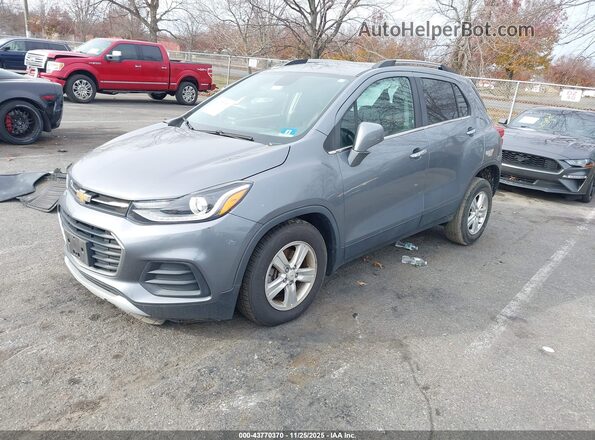 KL7CJPSB8KB810692 2019 CHEVROLET TRAX Серый Передняя левая четверть