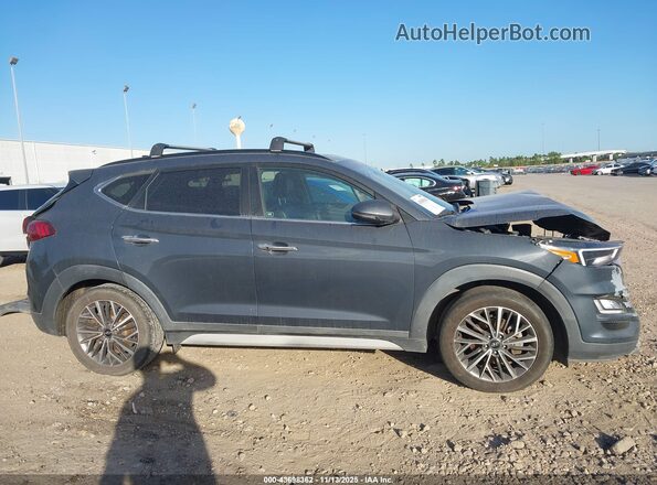 KM8J33AL3MU299872 2021 HYUNDAI TUCSON Gray Vista interior trasera