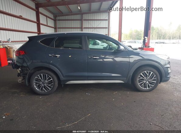 KM8J33AL9MU284857 2021 HYUNDAI TUCSON Gray Սալոնի հետևի տեսք