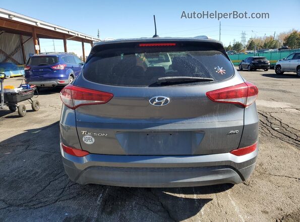 KM8J3CA4XGU125682 2016 HYUNDAI TUCSON Серый Вид сзади