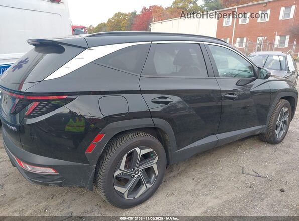 KM8JBDA29NU081193 2022 HYUNDAI TUCSON PLUG-IN HYBRID Black Widok wnętrza z tyłu