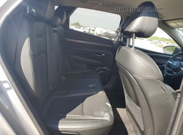 KM8JF3AE0PU263277 2023 HYUNDAI TUCSON Silver უკანა სალონის ხედი