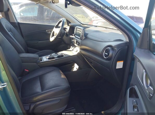 KM8K33AG8LU076958 2020 HYUNDAI KONA ELECTRIC Turquoise Widok wnętrza z przodu