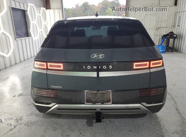 KM8KM4AEXNU088386 2022 HYUNDAI IONIQ Blue Vista trasera
