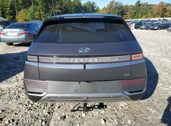 KM8KNDAF1NU103170 2022 HYUNDAI IONIQ Gray უკანა ხედი