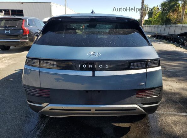 KM8KNDAF2PU217326 2023 HYUNDAI IONIQ Blue Вид ззаду