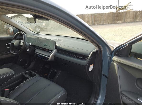 KM8KNDAF9NU103739 2022 HYUNDAI IONIQ 5 Blue Widok wnętrza z przodu