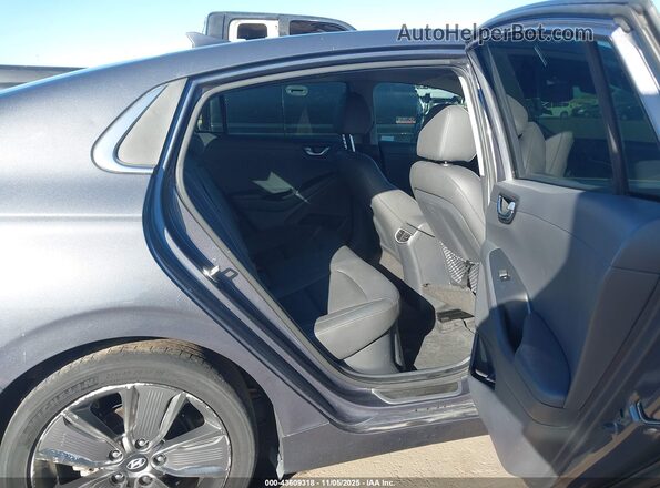 KMHC05LCXJU064259 2018 HYUNDAI IONIQ HYBRID Silver Widok naklejki z numerem VIN