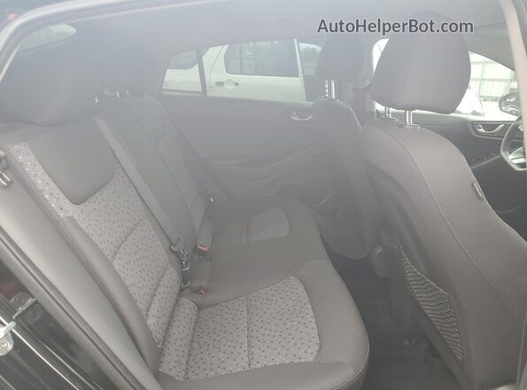 KMHC65LC0JU065094 2018 HYUNDAI IONIQ Black Widok tylnych siedzeń