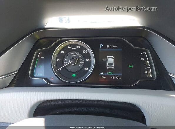 KMHC65LC9LU210281 2020 HYUNDAI IONIQ HYBRID White Rear seats view