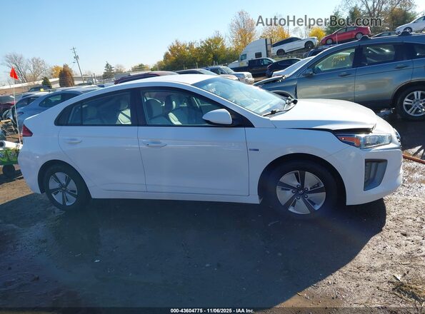 KMHC65LC9LU210281 2020 HYUNDAI IONIQ HYBRID White Rear interior view