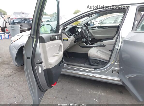 KMHE34L16GA012663 2016 HYUNDAI SONATA HYBRID Gray Widok wnętrza z przodu