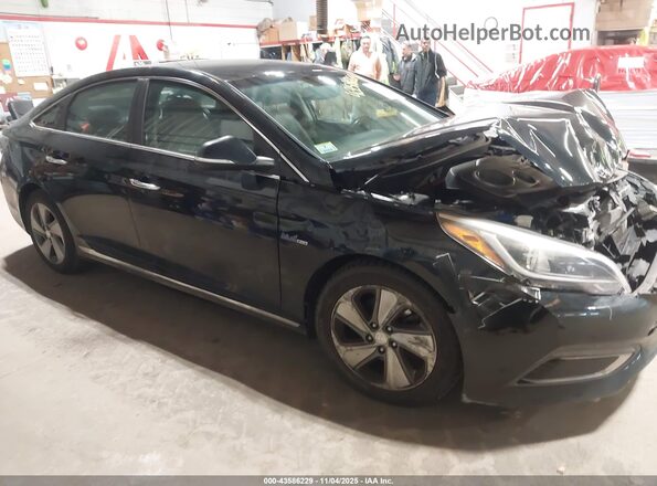 KMHE34L17GA026247 2016 HYUNDAI SONATA HYBRID Black Vista interior trasera