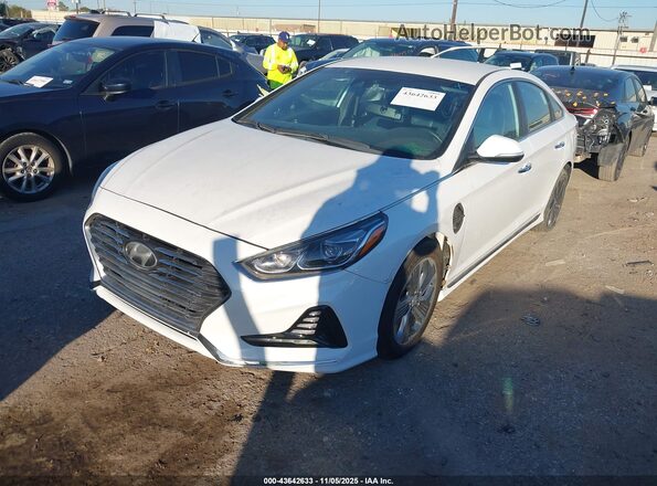 KMHE54L27KA091112 2019 HYUNDAI SONATA PLUG-IN HYBRID White Առջևի ձախ երեք քառորդ տեսարան