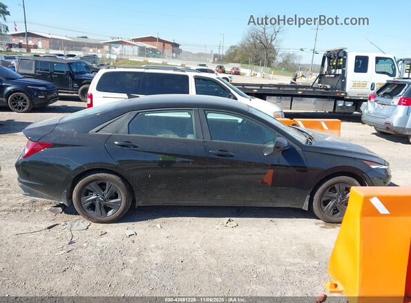 KMHLM4AJ4NU020862 2022 HYUNDAI ELANTRA HYBRID Черный Вид задней части салона