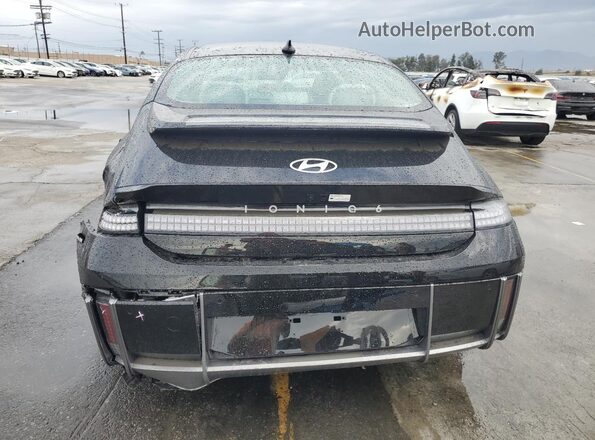 KMHM34AA7SA087864 2025 HYUNDAI IONIQ Black უკანა ხედი