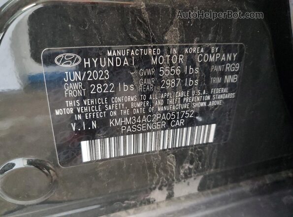 KMHM34AC2PA051752 2023 HYUNDAI IONIQ Green VIN კოდის სტიკერის ხედი