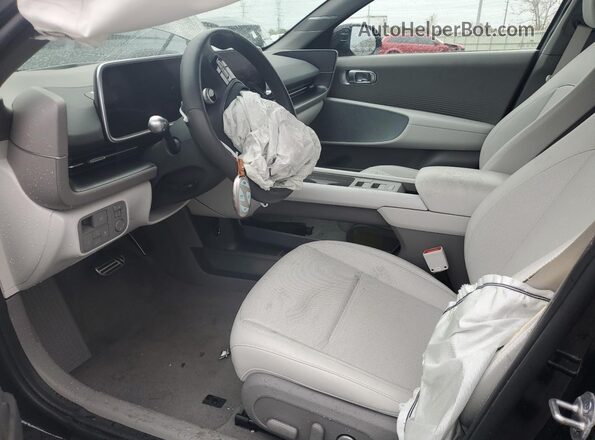 KMHM54AC6SA087110 2025 HYUNDAI IONIQ Black Widok wnętrza z przodu
