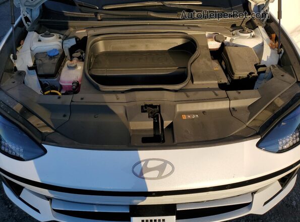 KMHM54AC7PA019597 2023 HYUNDAI IONIQ White Rear interior view