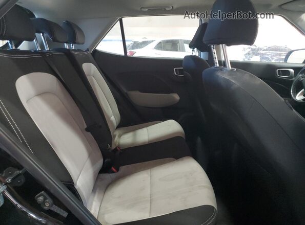 KMHRC8A32LU015503 2020 HYUNDAI VENUE Black Rear seats view