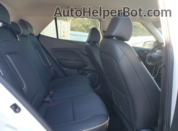 KMHRC8A34RU321000 2024 HYUNDAI VENUE White Սալոնի հետևի տեսք
