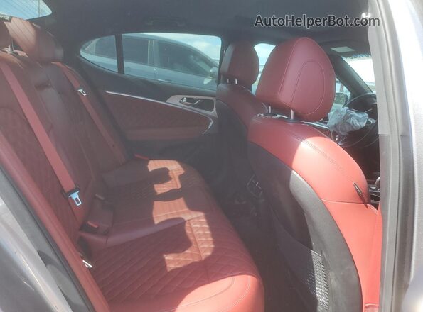KMTG54TEXPU121587 2023 GENESIS G70 Silver Vista de los asientos traseros
