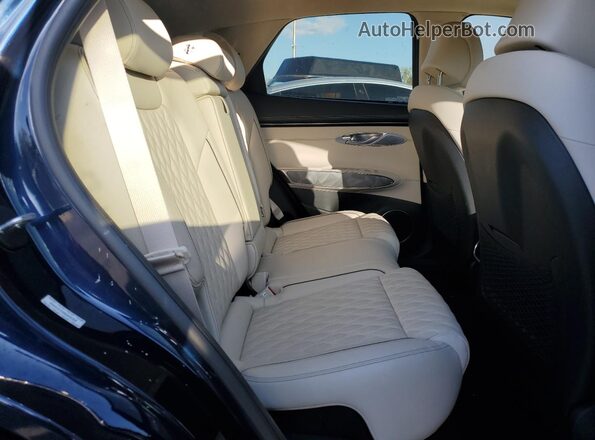 KMUMCDTC5NU035328 2022 GENESIS GV70 Blue უკანა სალონის ხედი