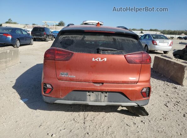 KNDCC3LC2N5546594 2022 KIA NIRO Orange Rear view