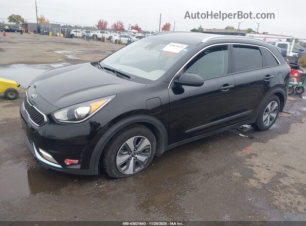 KNDCM3LD9J5144992 2018 KIA NIRO PLUG-IN HYBRID Black Front left