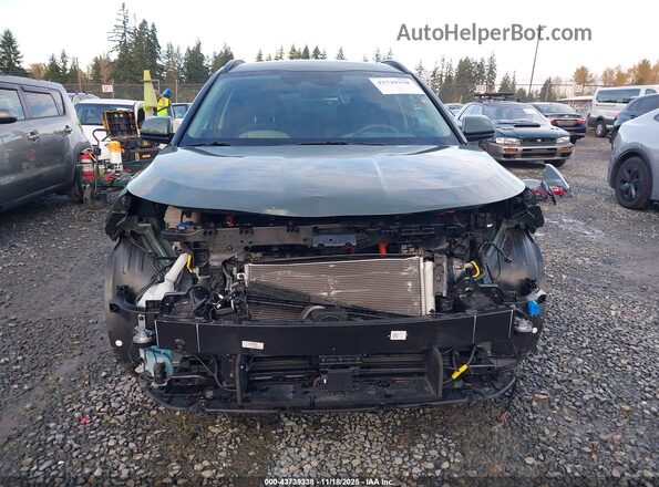 KNDCT3LEXS5235699 2025 KIA NIRO Green Rear interior view