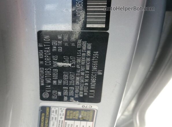 KNDMB5C11M6667594 2021 KIA SEDONA Silver Vista de la etiqueta del VIN
