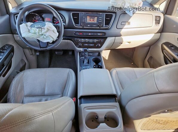 KNDMB5C13G6194592 2016 KIA SEDONA Коричневый Вид панели приборов