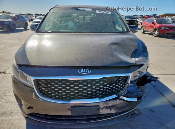 KNDMB5C13G6194592 2016 KIA SEDONA Коричневый Вид спереди