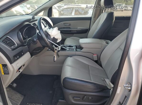 KNDMB5C17K6556531 2019 KIA SEDONA Silver წინა სალონის ხედი
