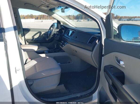 KNDMB5C18G6188321 2016 KIA SEDONA Белый Вид салона спереди