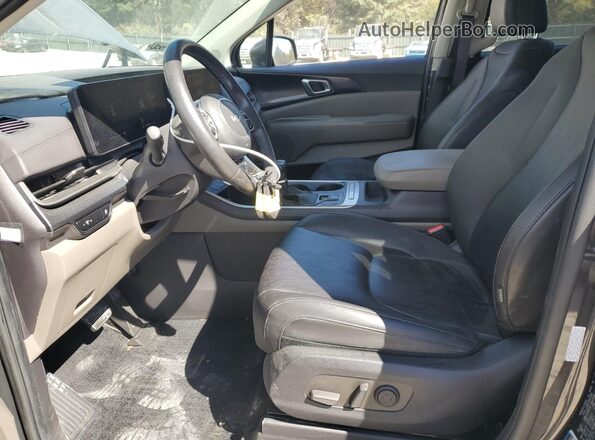 KNDNB5K32S6453976 2025 KIA CARNIVAL Black Widok wnętrza z przodu