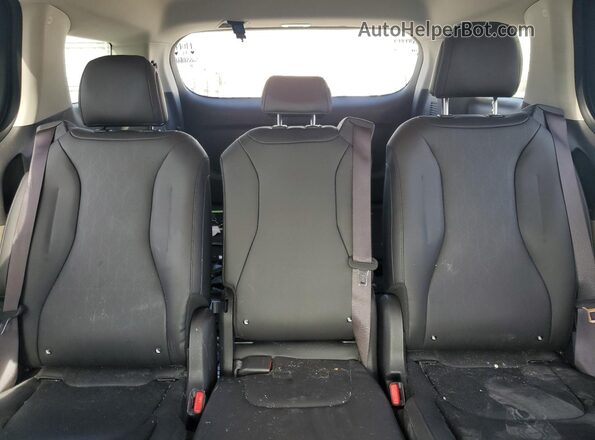 KNDNB5K35S6498653 2025 KIA CARNIVAL Black უკანა სავარძლების ხედი