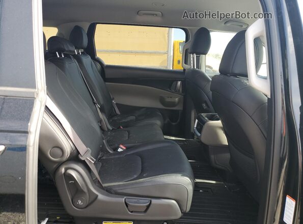 KNDNB5K35S6498653 2025 KIA CARNIVAL Black უკანა სალონის ხედი