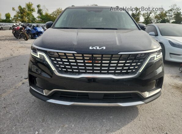 KNDNE5H37P6257991 2023 KIA CARNIVAL Black Front view