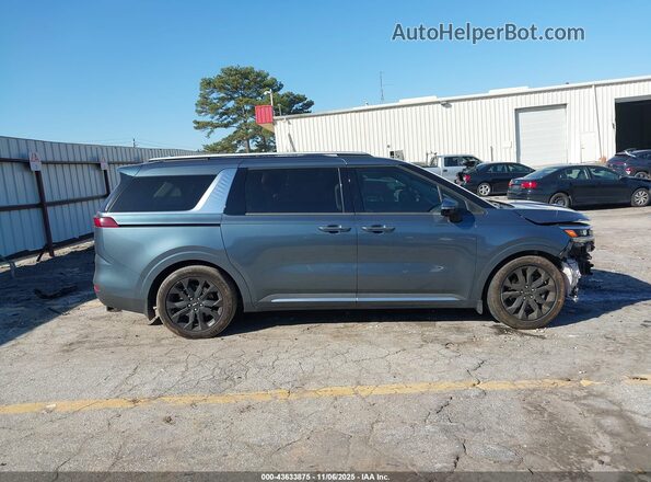 KNDNE5H38N6060048 2022 KIA CARNIVAL MPV Gray Vista interior trasera