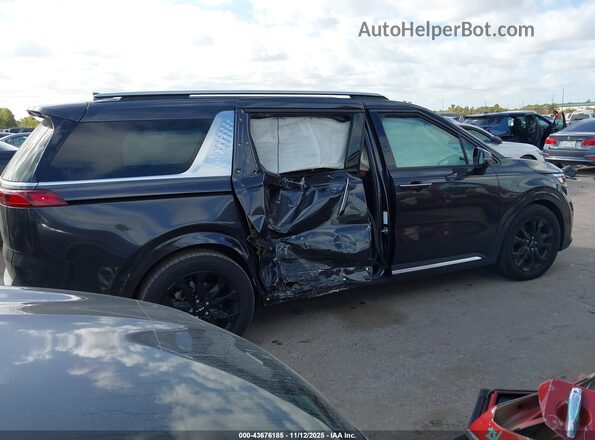 KNDNE5H3XN6130102 2022 KIA CARNIVAL MPV Gray Widok wnętrza z tyłu