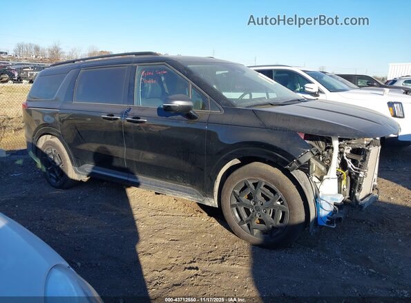 KNDNE5KA7S6047021 2025 KIA CARNIVAL MPV HYBRID Black Widok wnętrza z tyłu