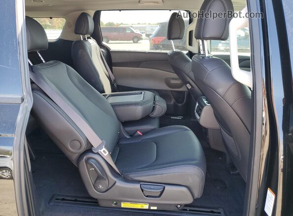 KNDNE5KAXS6069434 2025 KIA CARNIVAL Black Vista interior trasera