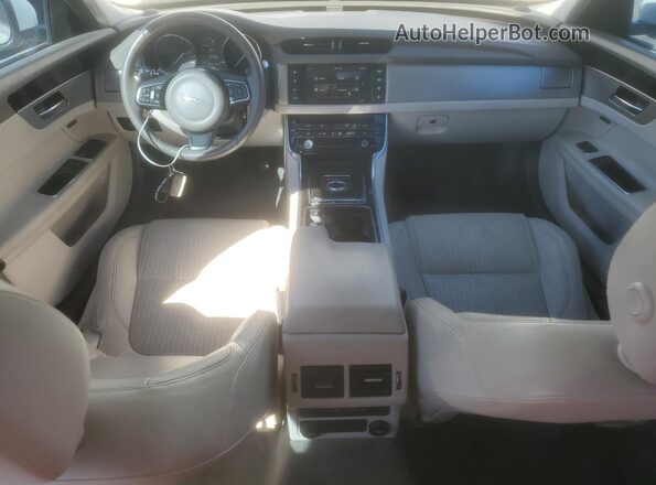 SAJBE4BV8GCY13557 2016 JAGUAR XF Белый Вид панели приборов