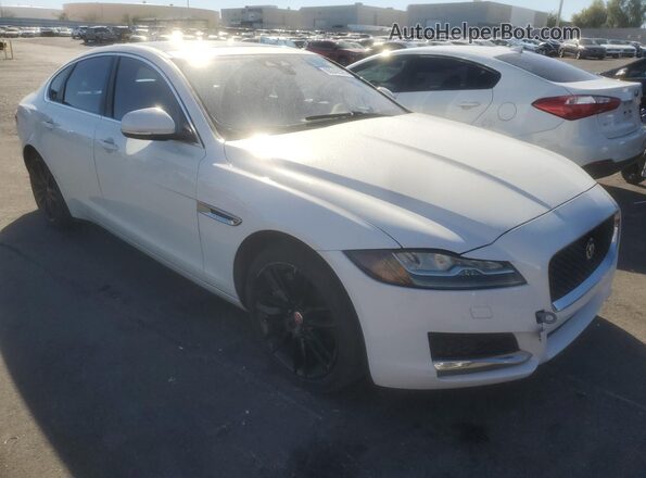 SAJBE4BV8GCY13557 2016 JAGUAR XF Белый Передняя правая четверть