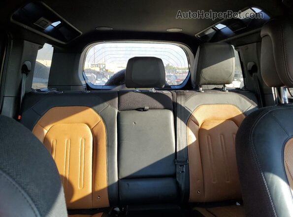 SALEX7RU8M2042175 2021 LAND ROVER DEFENDER Tan Vista de los asientos traseros