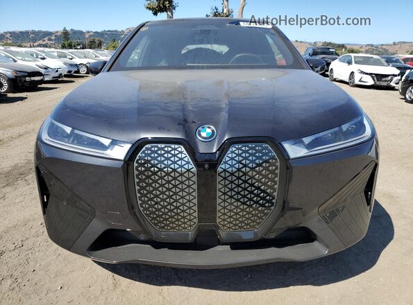 WB523CF00SCU13476 2025 BMW IX Black Vista frontal